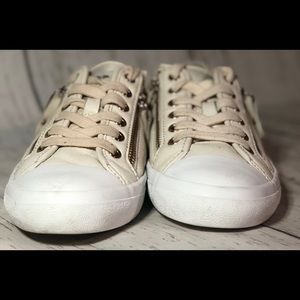 Coach “Empire Zipper” women’s shoes.